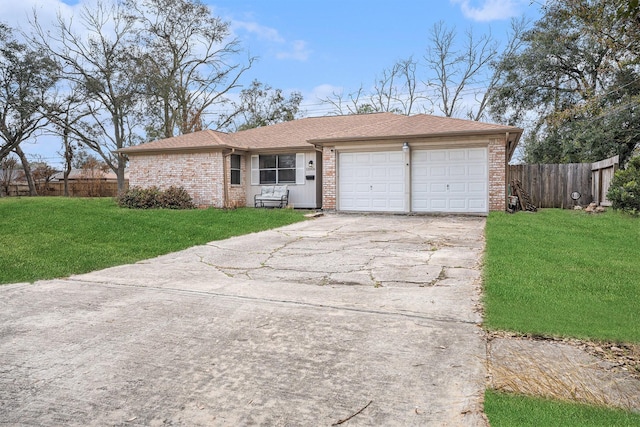 ranch-style house with a garage and a front yard