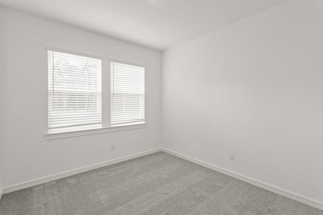 unfurnished room with carpet floors