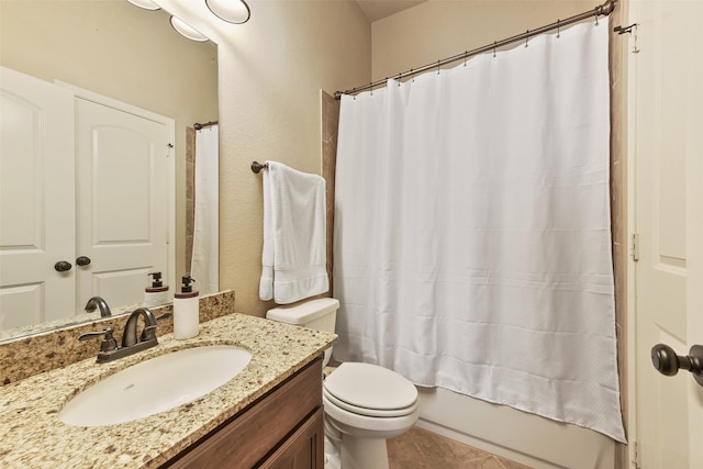 full bathroom featuring vanity, tile patterned flooring, toilet, and shower / bath combo with shower curtain