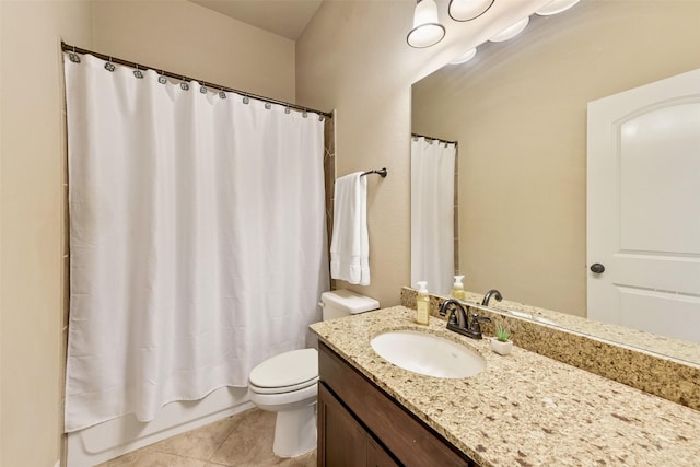 full bathroom with vanity, tile patterned flooring, toilet, and shower / bath combo with shower curtain