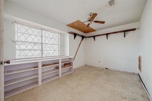 bonus room with ceiling fan