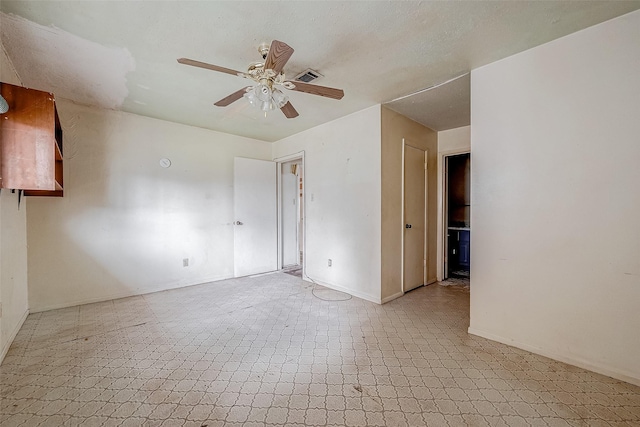 empty room featuring ceiling fan