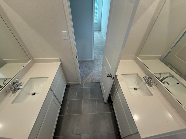 bathroom featuring tile patterned floors and vanity