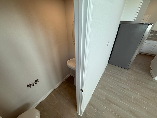 bathroom featuring toilet