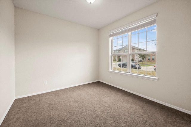 empty room featuring carpet flooring