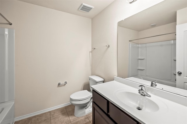 full bathroom featuring tile patterned flooring, vanity, tub / shower combination, and toilet