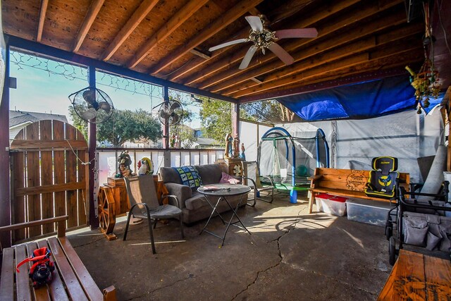 view of patio featuring ceiling fan