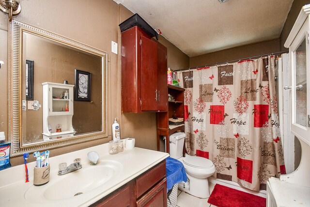 bathroom with walk in shower, vanity, toilet, and a textured ceiling