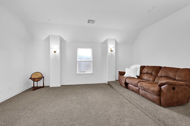 living room with carpet floors and vaulted ceiling