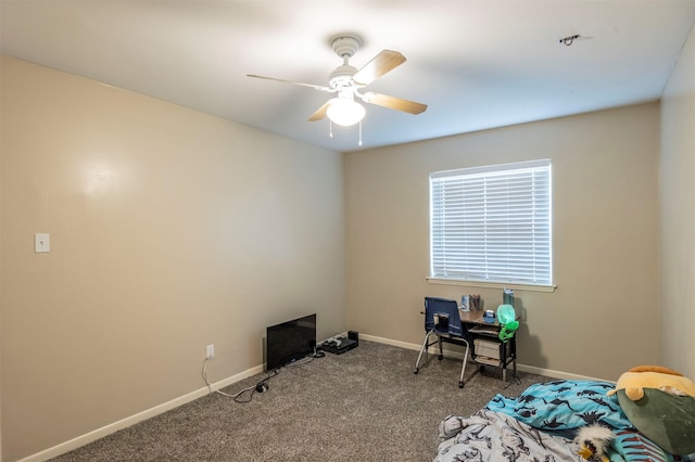 unfurnished bedroom featuring ceiling fan and carpet flooring