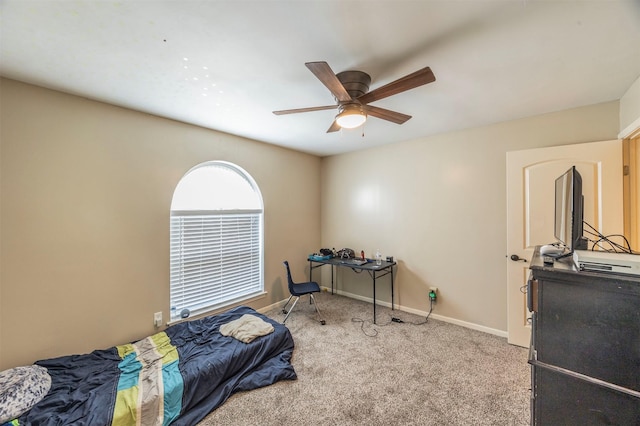 bedroom featuring ceiling fan and light colored carpet