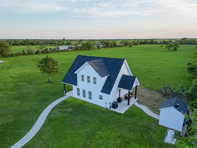 aerial view at dusk with a rural view