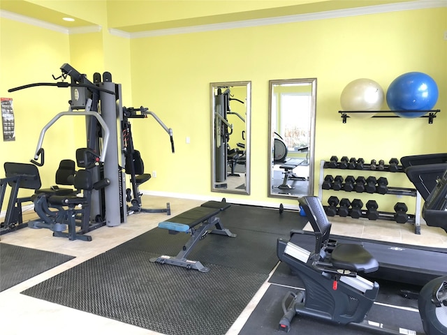 exercise room featuring ornamental molding