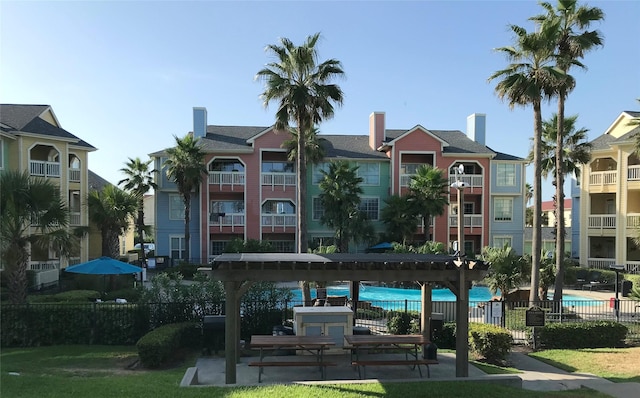 view of property with a community pool