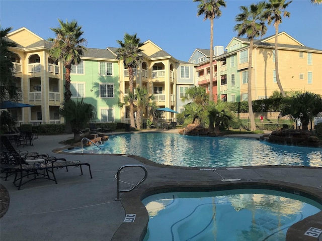 view of swimming pool with a patio area