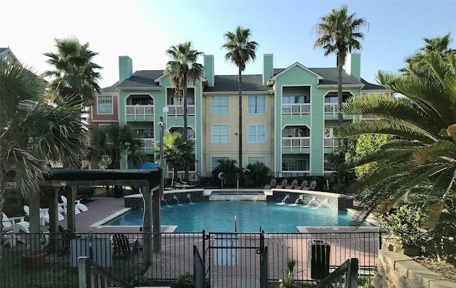 view of pool featuring pool water feature