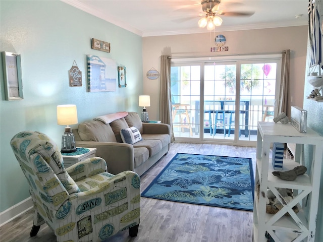 living room featuring crown molding, ceiling fan, and hardwood / wood-style flooring