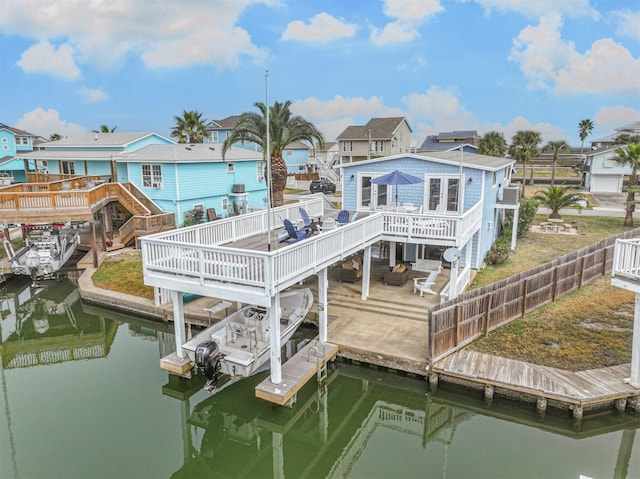 view of dock featuring a deck with water view