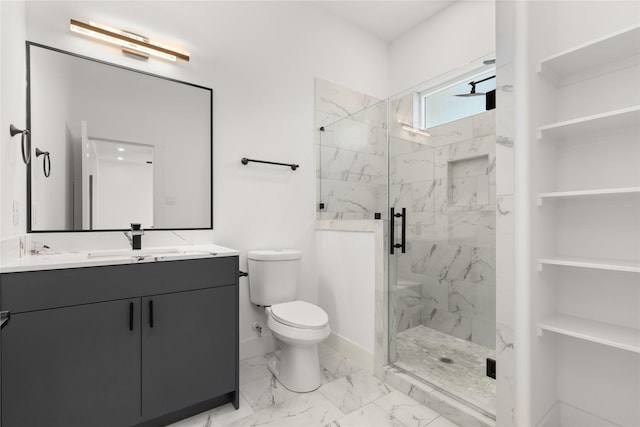 bathroom with vanity, toilet, and walk in shower