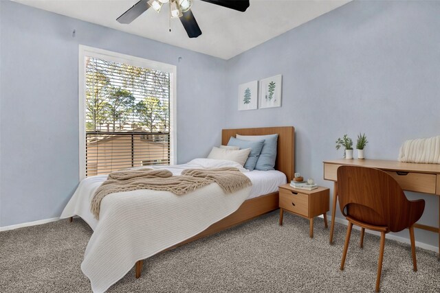 bedroom featuring carpet, baseboards, and ceiling fan