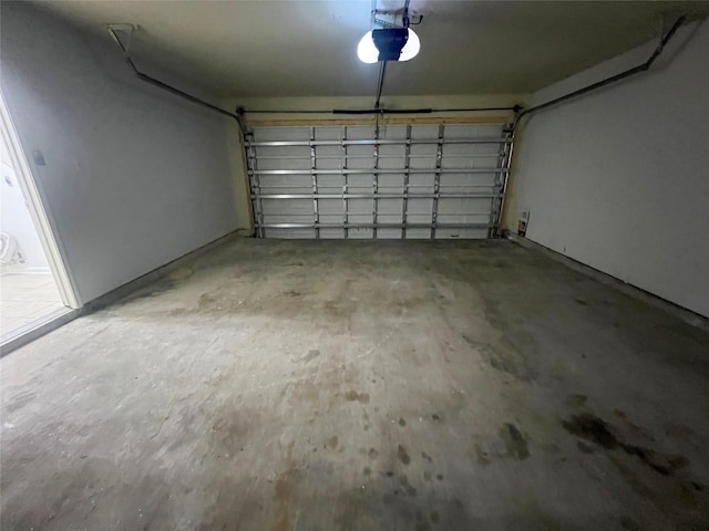 garage featuring a garage door opener