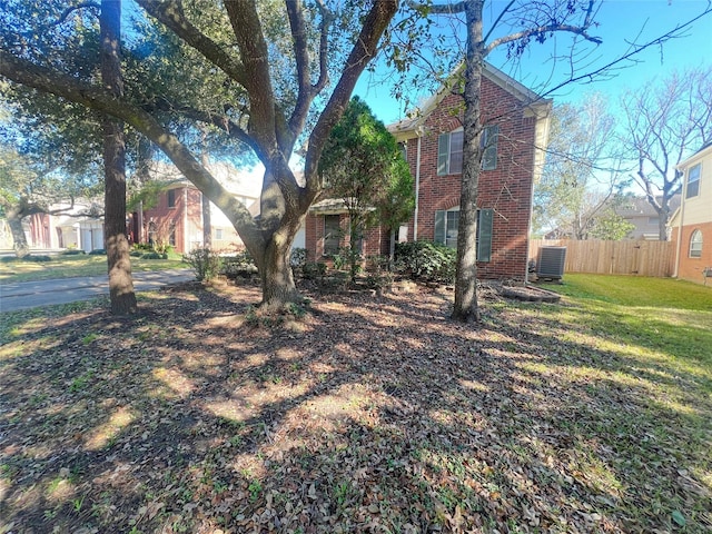 view of yard with central AC