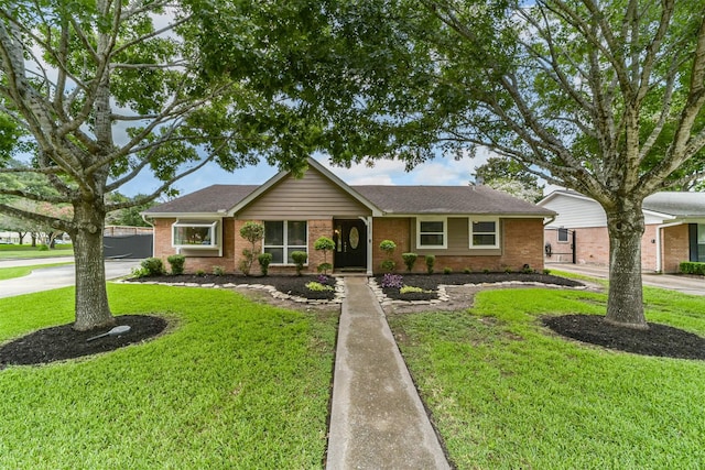 ranch-style home with a front yard