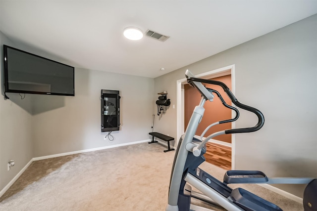 workout room with carpet flooring