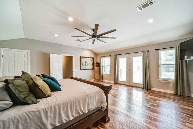 bedroom featuring lofted ceiling, access to exterior, light hardwood / wood-style floors, and ceiling fan