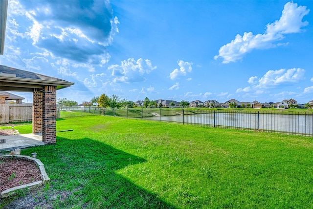 view of yard featuring a water view