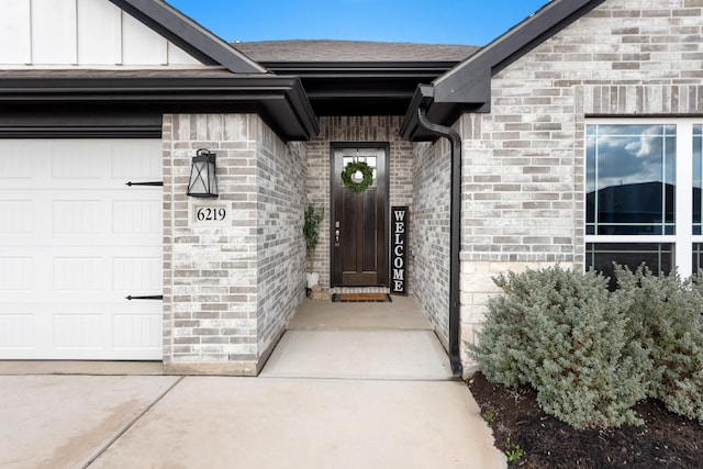 entrance to property featuring a garage