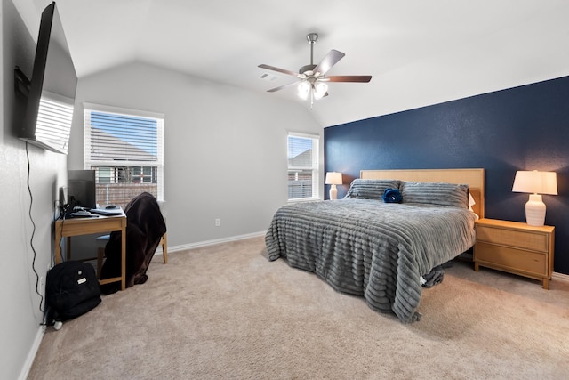 carpeted bedroom featuring ceiling fan and lofted ceiling