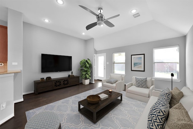 living room with lofted ceiling, dark wood-type flooring, and ceiling fan