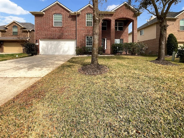 view of front of property with a garage and a front lawn