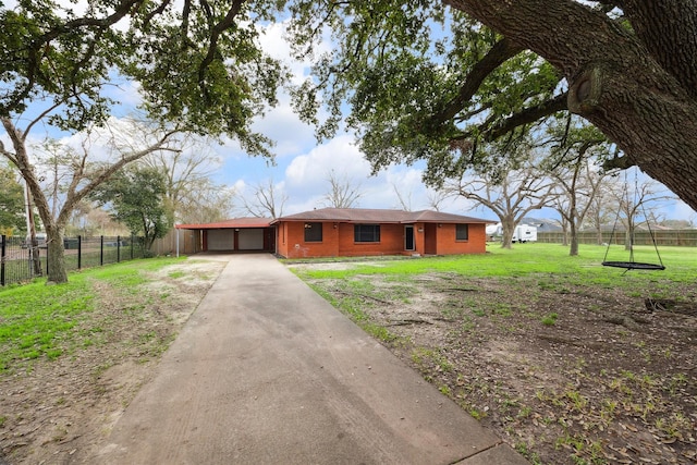 single story home featuring a garage and a front lawn