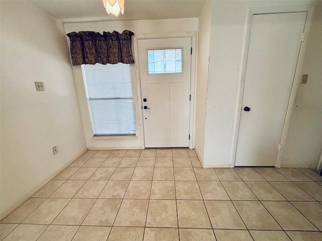 entryway featuring light tile patterned flooring