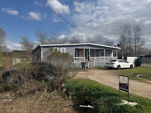 view of front of property featuring covered porch