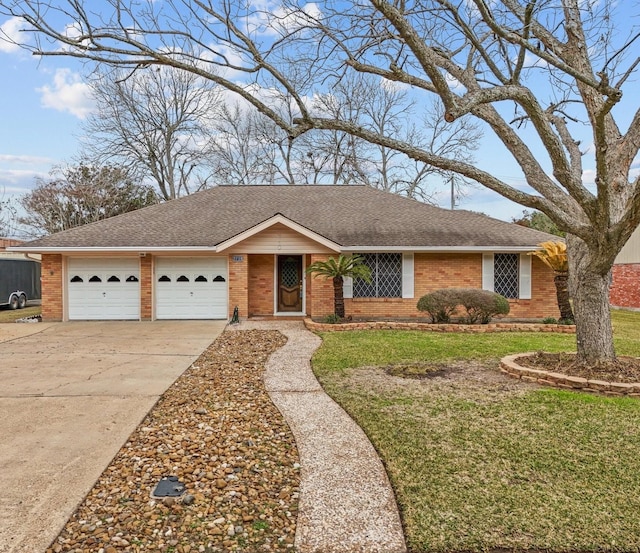 ranch-style house featuring driveway, roof with shingles, an attached garage, and brick siding