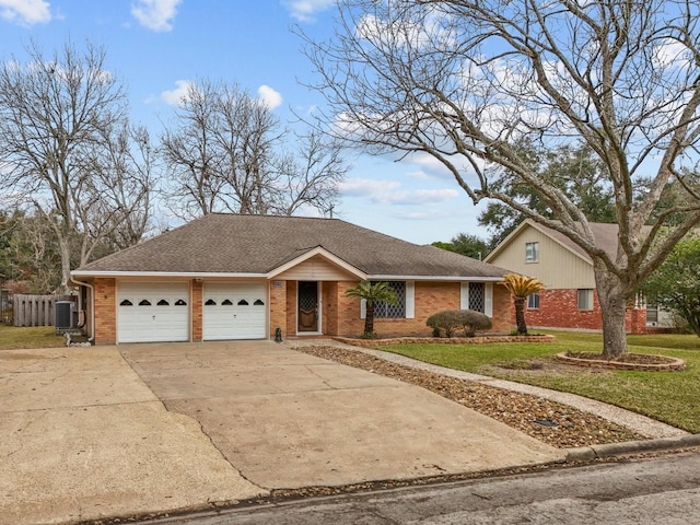 single story home with brick siding, roof with shingles, central air condition unit, concrete driveway, and a garage