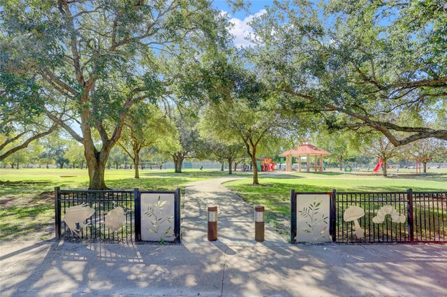 view of community featuring a yard and a gazebo