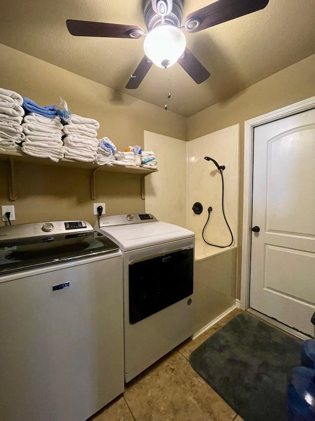 washroom featuring light tile patterned floors, a textured ceiling, washing machine and clothes dryer, and ceiling fan