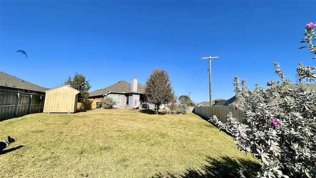 view of yard with a shed