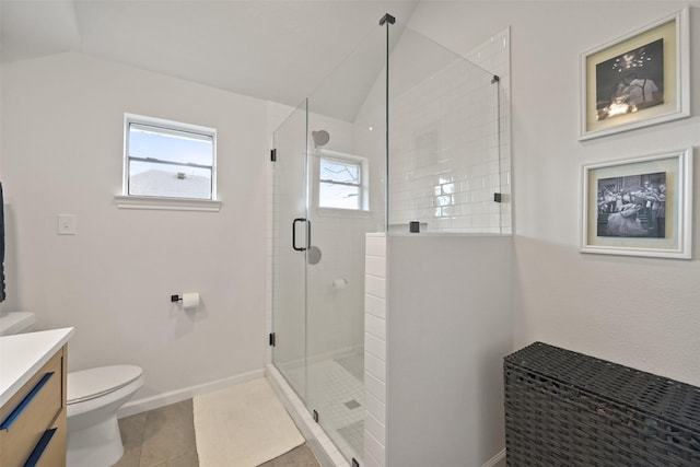 full bath with vanity, vaulted ceiling, toilet, and a stall shower