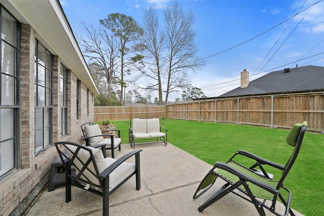 view of patio with a fenced backyard