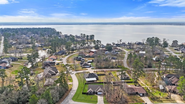 aerial view with a residential view and a water view