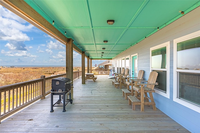 wooden deck with grilling area