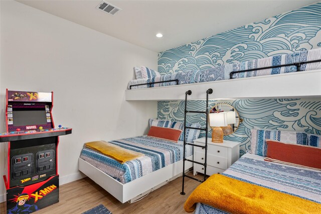 bedroom featuring wood-type flooring