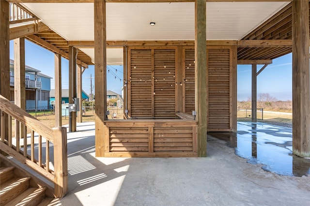 view of patio with an outbuilding