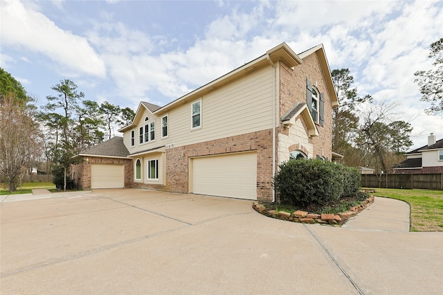 view of side of property featuring a garage