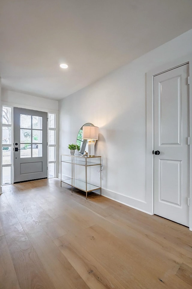 doorway with light hardwood / wood-style floors